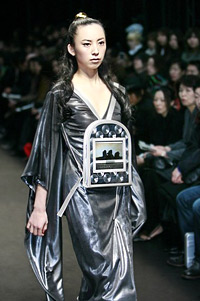 Model, dressed with dress with LCD display from the collection autumn-winter 2007 of Emiko Miki during the Japanese week of the fashion