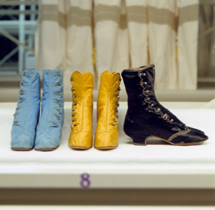 Boots with buttons at heels that were a possession of Louis XV in the period1865-1875 